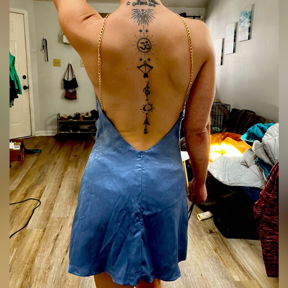 Small unique thin blue dress with gold chains